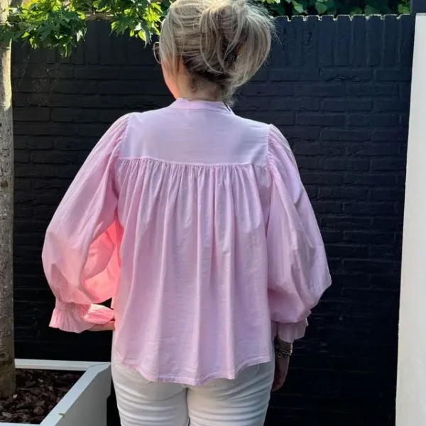 Roze blouse met pofmouwen