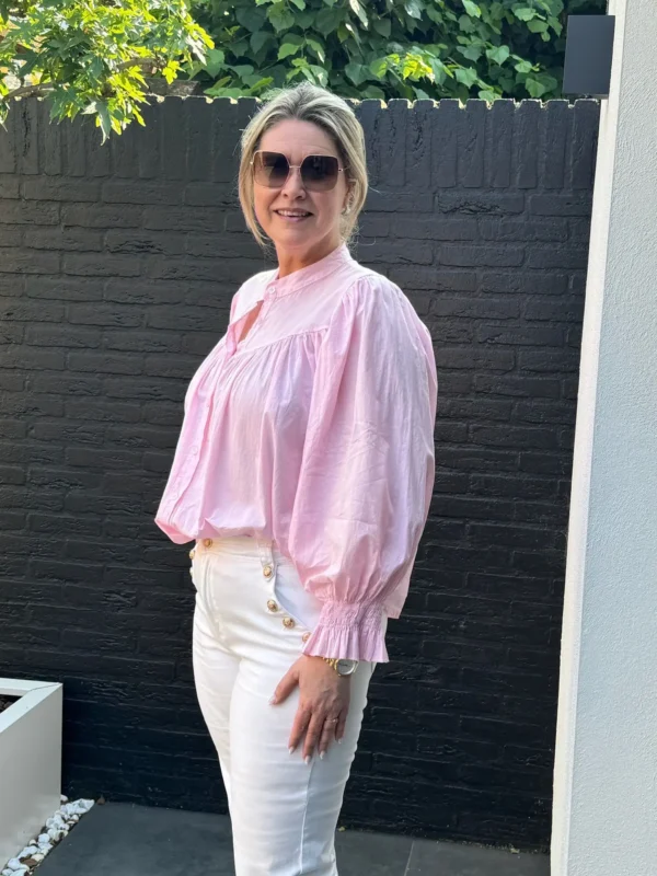 wijde vallende blouse met pofmouwen roze